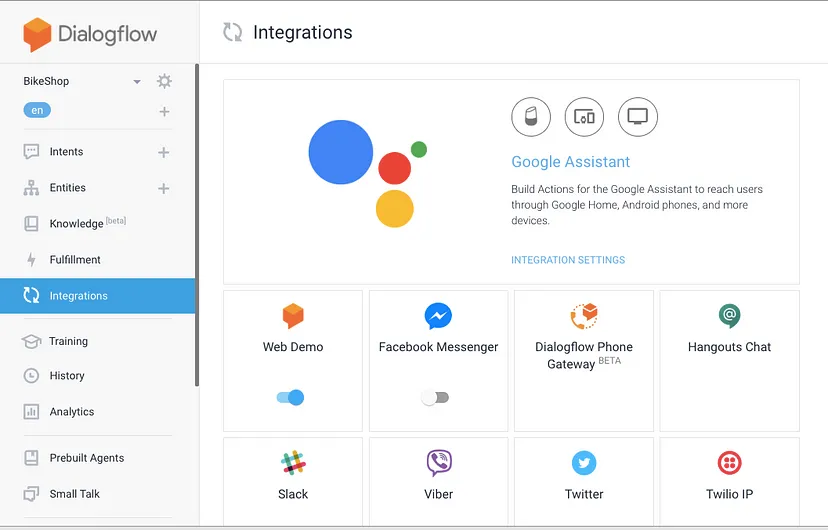 Interface Dialogflow montrant la section ' Intégrations ' avec Google Assistant et diverses options de plateforme de messagerie comme Facebook Messenger, Slack et Twitter.